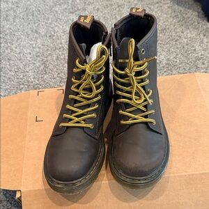 Dr. Martens boots with Yellow Laces